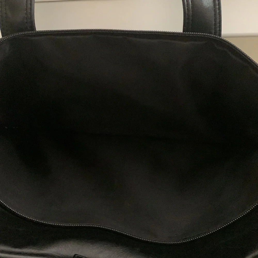 NWOT Genuine black leather slim briefcase